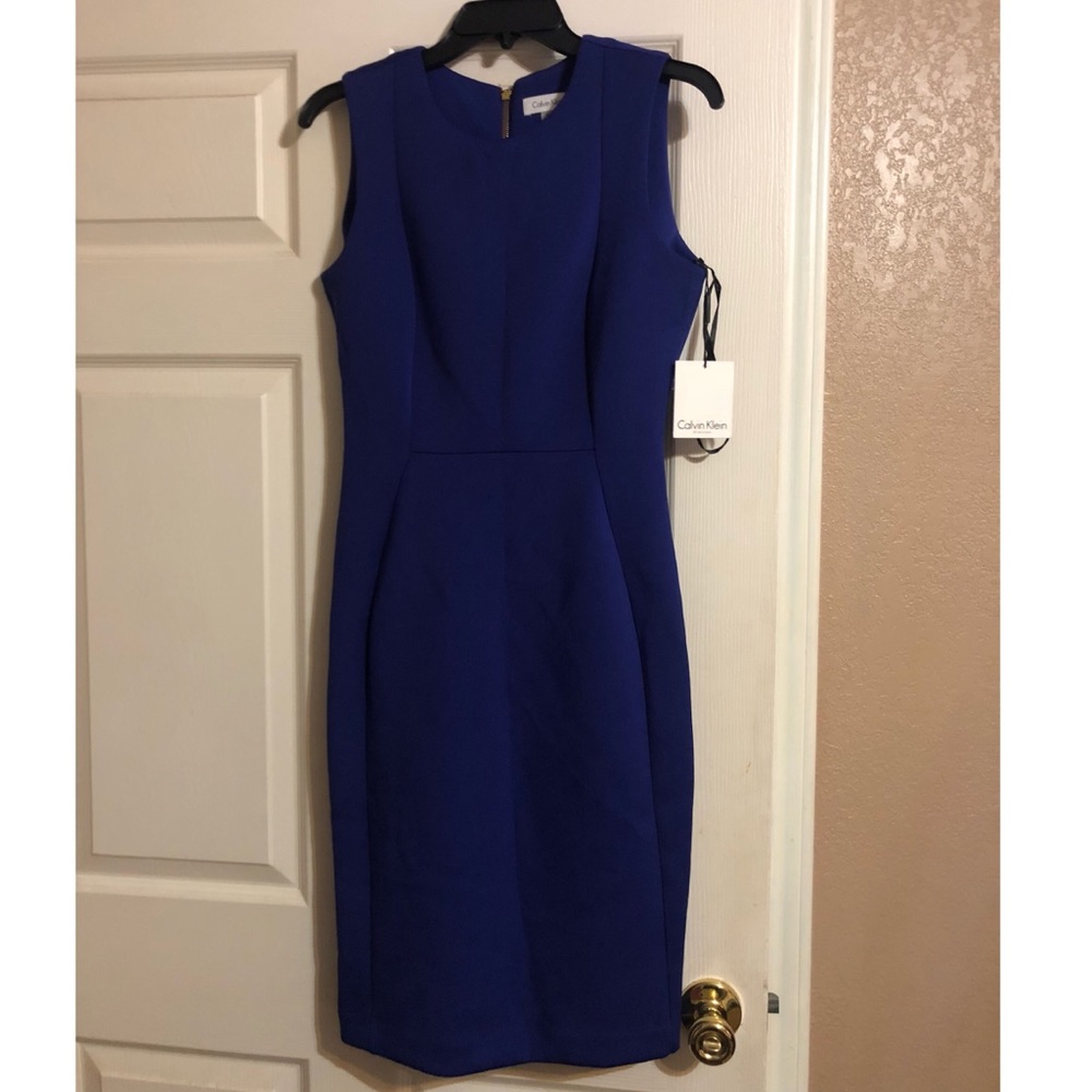 Blue body con dress